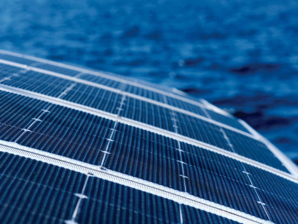 Detailed view of integrated solar panels on an eco-friendly luxury yacht.